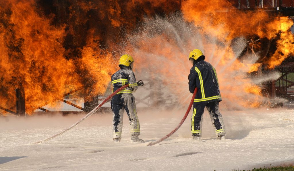 fire crew fighting aircraft fire